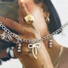 SILVER BOW CHARM BRACELET - Image 2