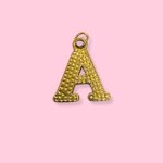 A BIG MONOGRAM GOLD CHARM 2CM